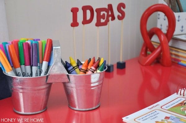 Corral markers and crayons in galvanized tins 
