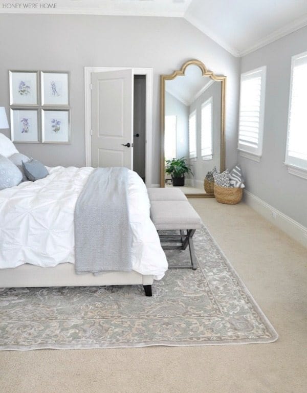 neutral master bedroom, love the Restoration Hardware leaning mirror and white bedding with neutral rug 