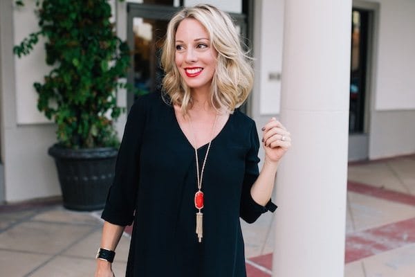 Fall fashion - little black dress with red Kendra Scott necklace and fringe heels - date night here I come!