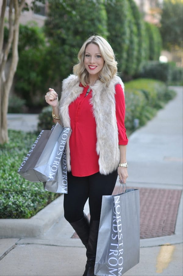 Holiday outfit- red tunic top, black leggings, knee high boots, faux fur vest