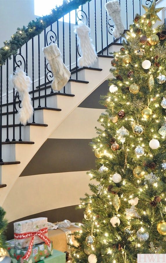 Sparkly Christmas Tree with metallic ornaments and faux fur stockings | Honey We're Home