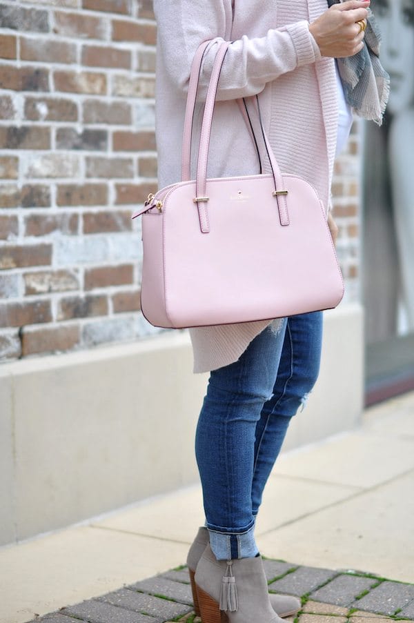 Perfect size pink Kate Spade bag with scarf and pink 'cocoon' cardigan, jeans and booties.