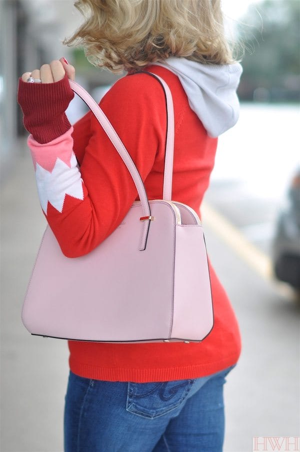 Beautiful pink Kate Spade bag and red hooded sweater with pink and white accents on sleeves.