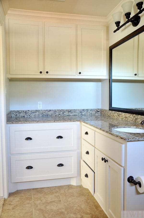 Bathroom with deep counters perfect for drying and changing a baby, with extra large drawers to function as dresser for clothes or other storage | Honey We're Home