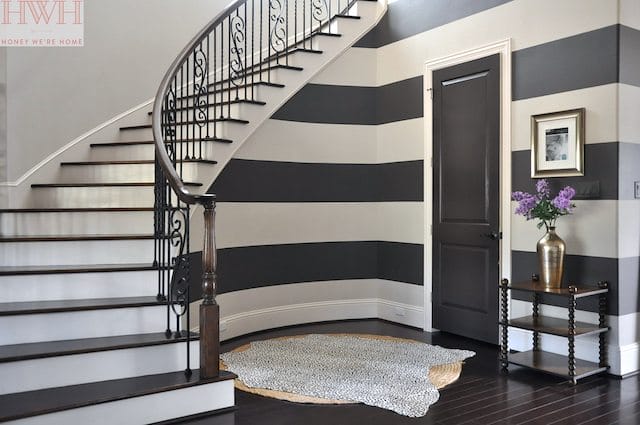 painted stripes and curved staircase 
