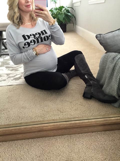 Winter fashion | Need Coffee sweatshirt & knee high boots with leggings - cute, casual pregnancy outfit #maternitystyle #dressingthebump