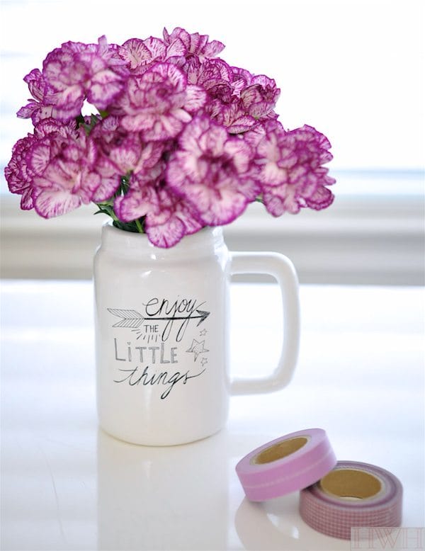 Love keeping fresh flowers in unexpected vessels like this mason jar mug 
