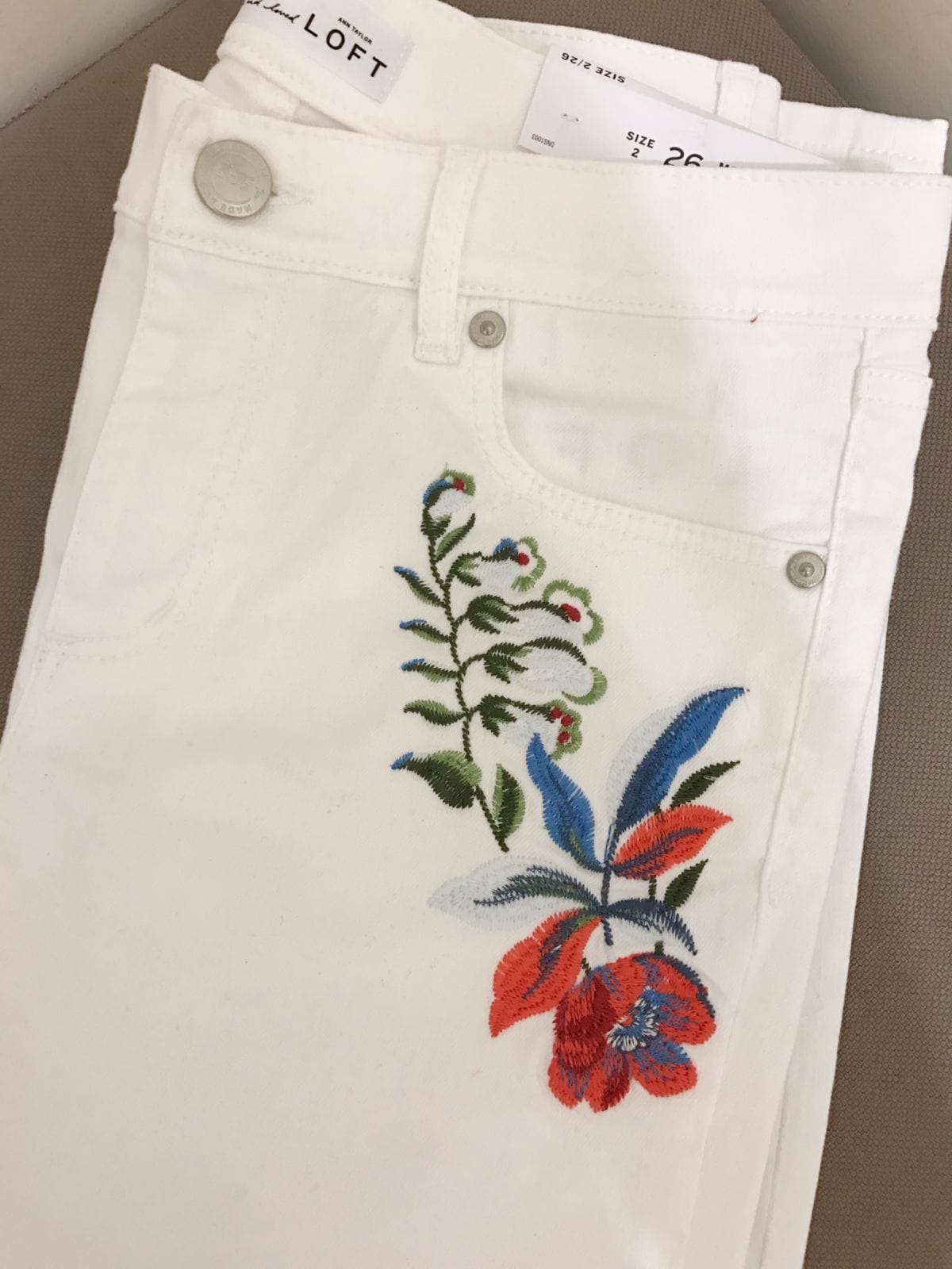 white floral jeans