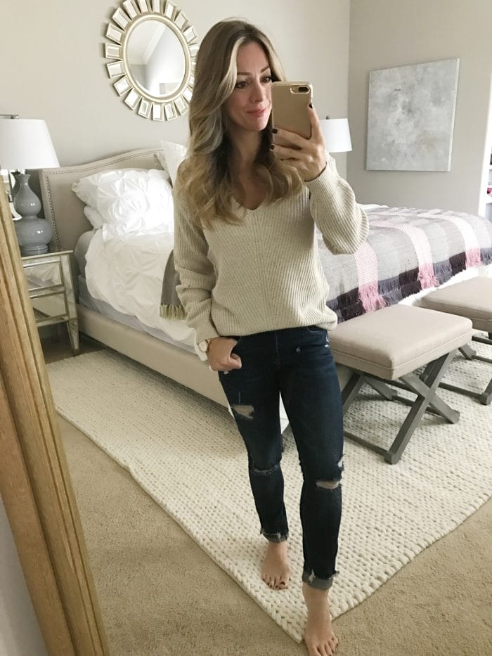Fall fashion - dressing room try on, ripped jeans and v-neck sweater #fallfashion