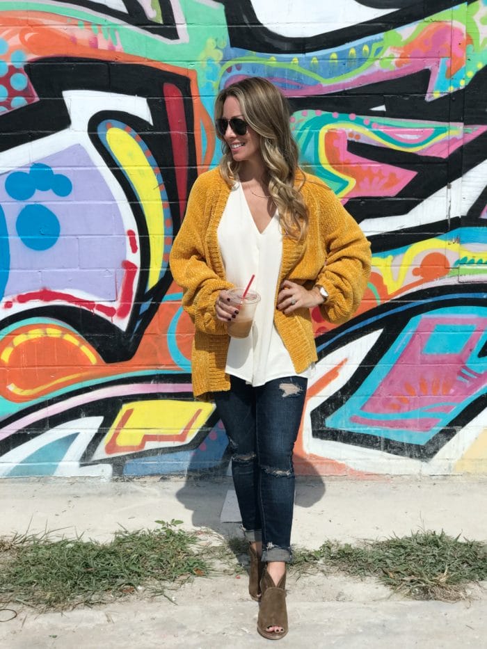 Fall fashion - softest yellow cardigan and ripped jeans with booties