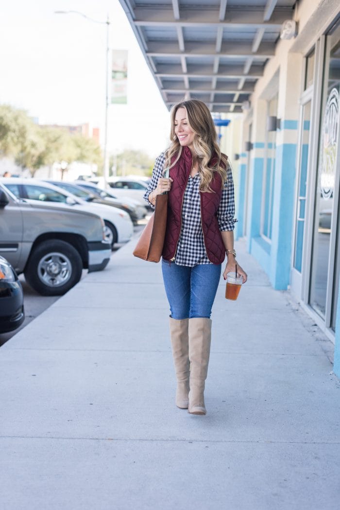 gingham top with tall boots and maroon vest #Fallfashion