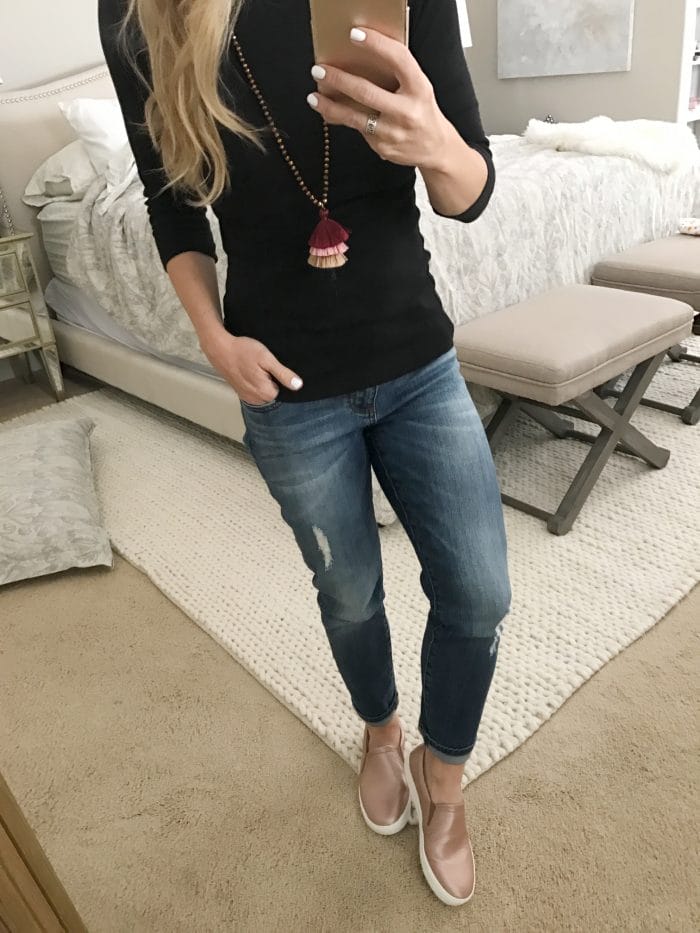 Black tee and rose gold sneakers