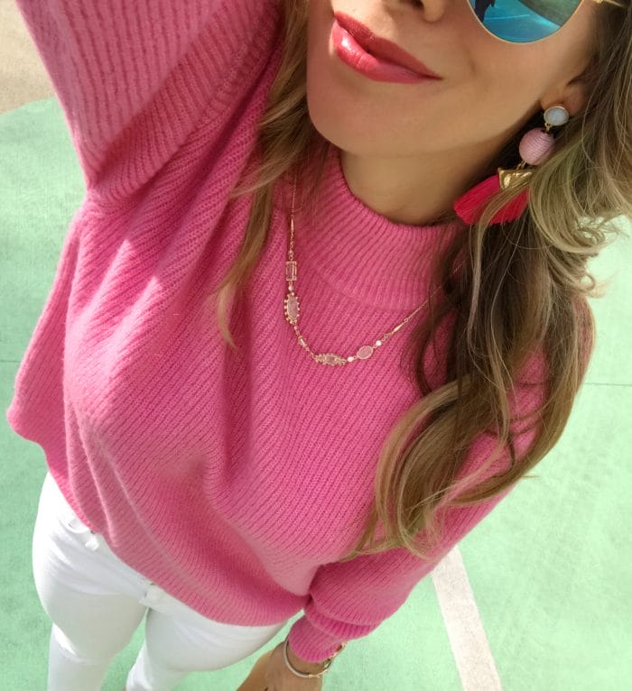 Pink sweater and tassel earrings