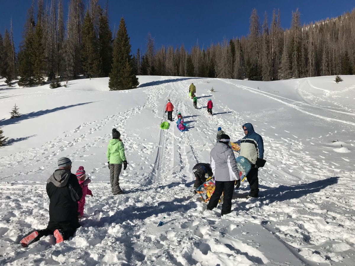 Family ski trip with toddler - sledding (1)