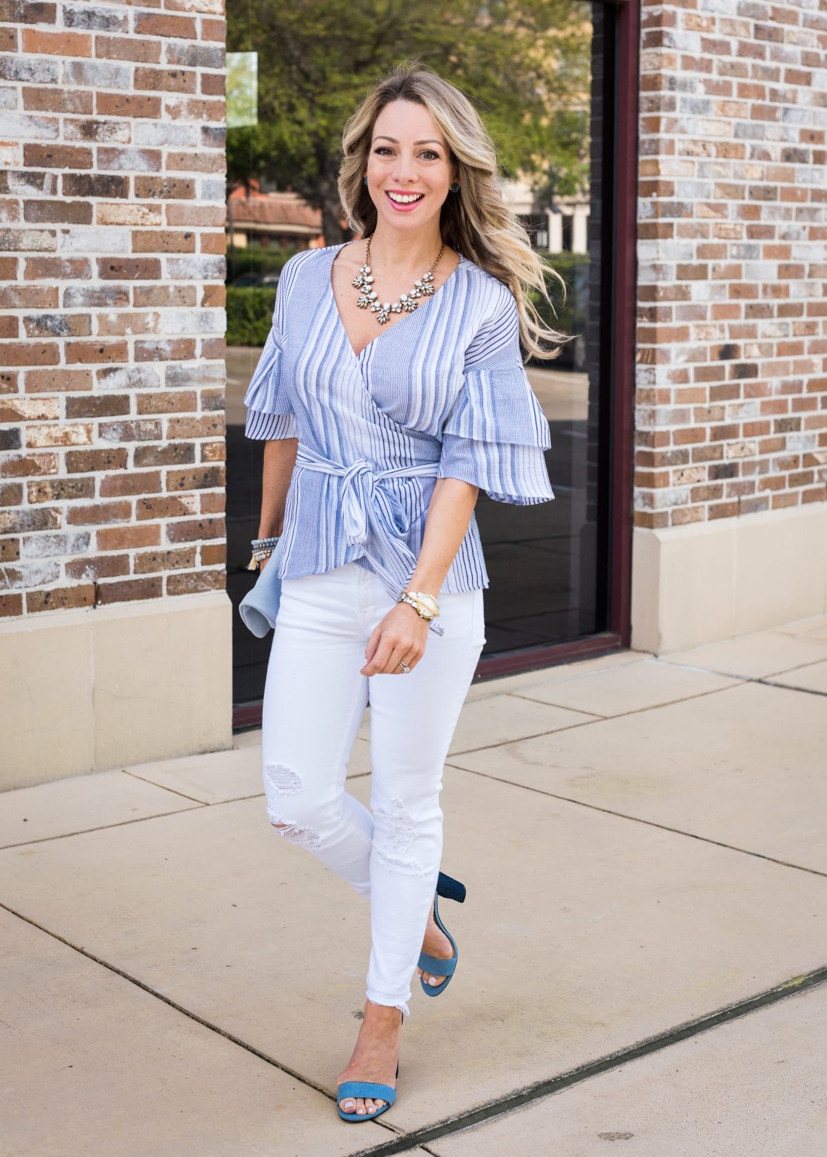 Spring Outfit - blue wrap ruffle sleeve top and white jeans 1