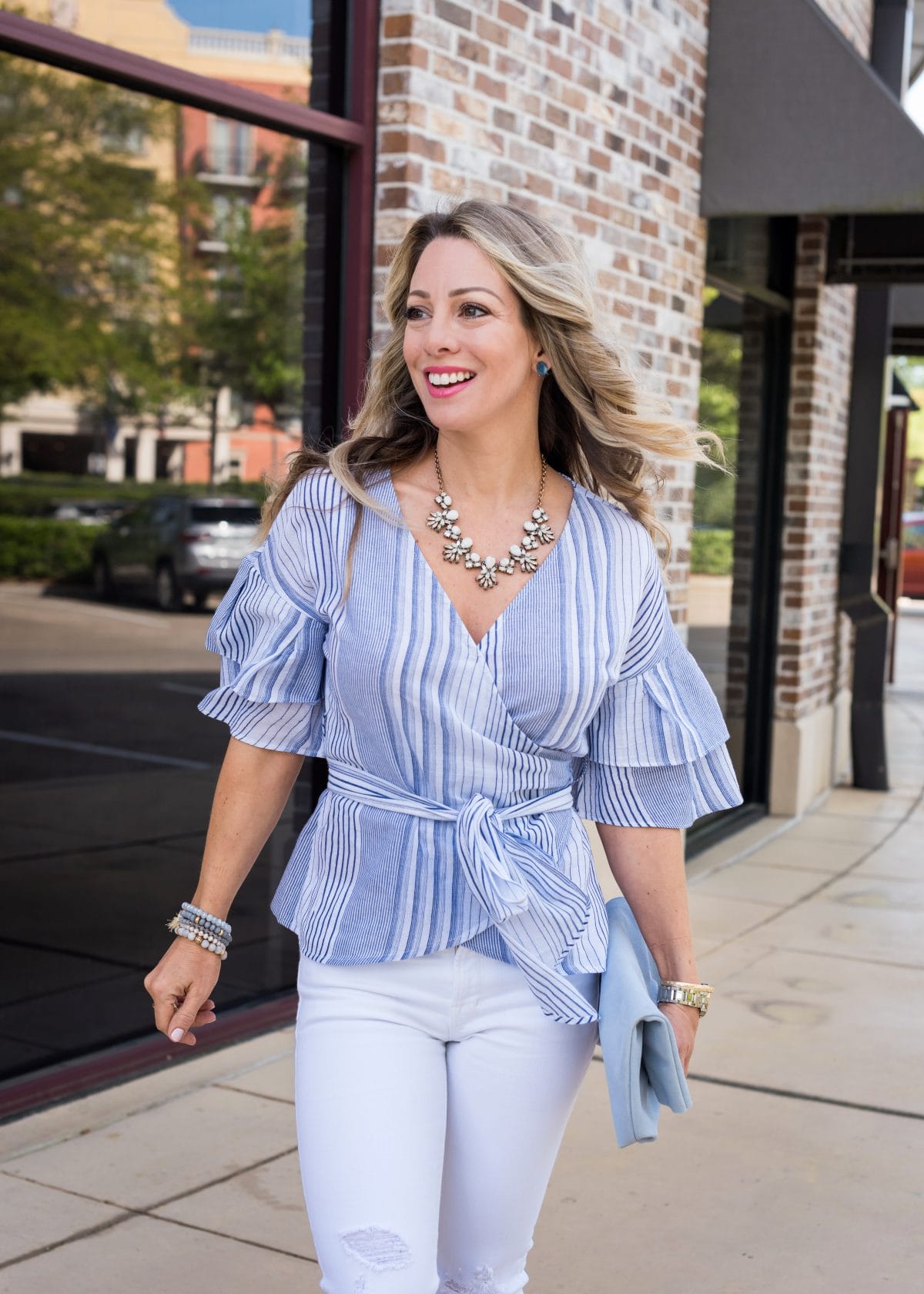 Spring Outfit - blue wrap ruffle sleeve top and white jeans 4
