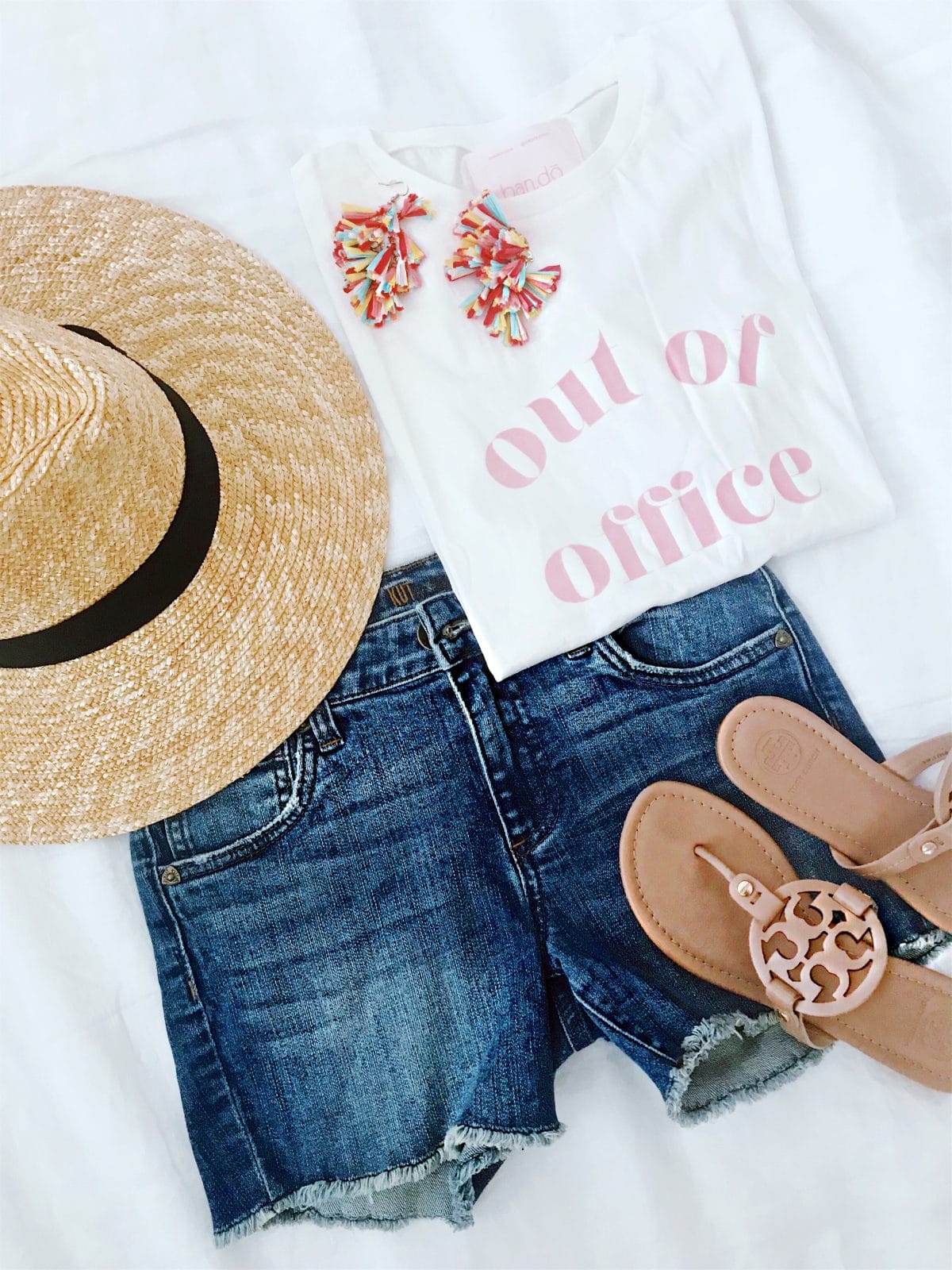 Spring and summer outfit - out of office t-shirt with straw hat jean shorts and Tory Burch Miller Sandals 