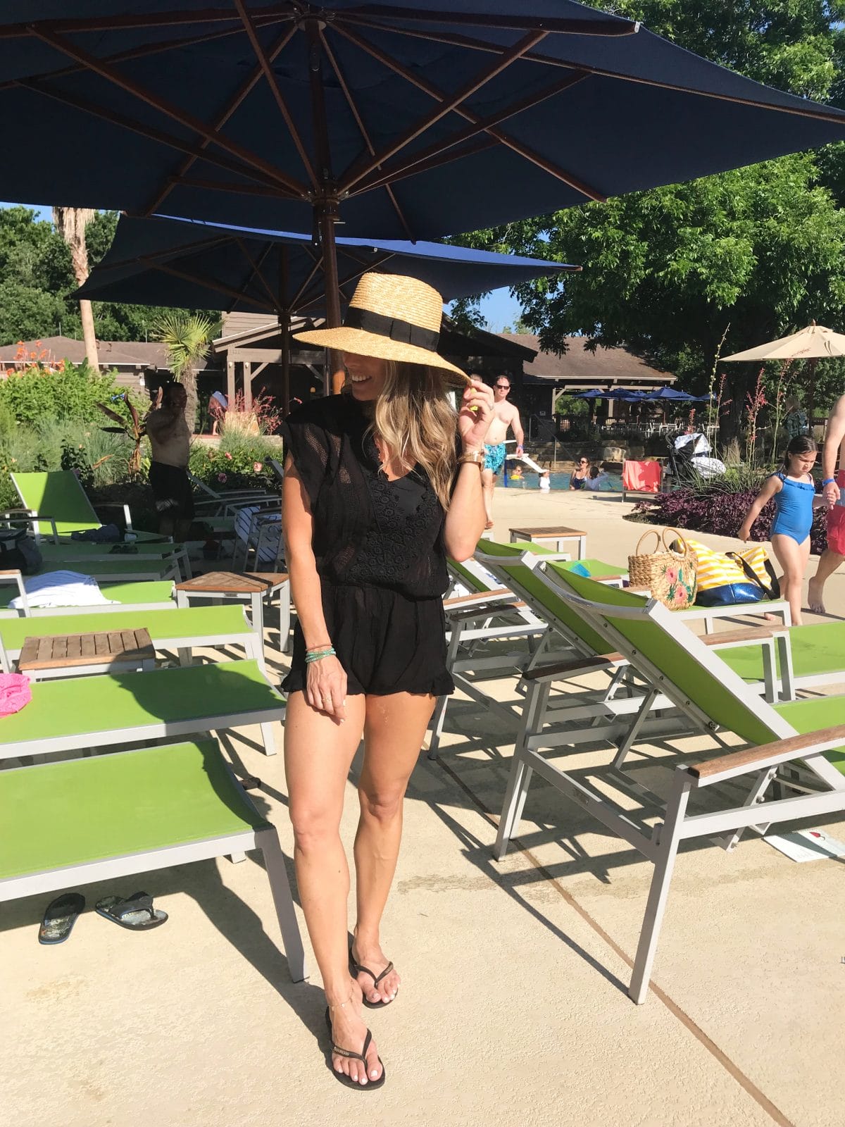 Swimsuit coverup with straw hat and flip flops