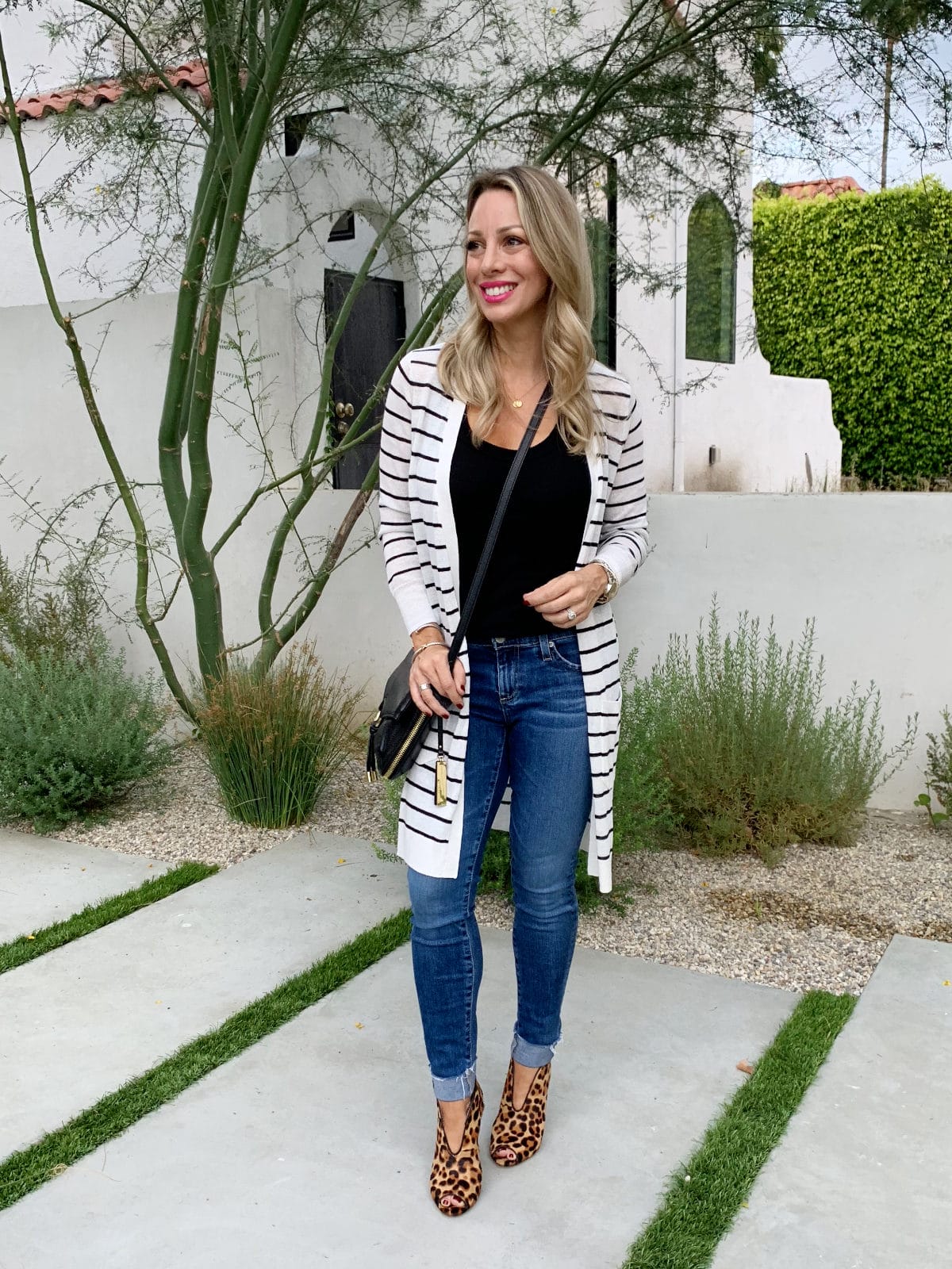 Cute Fall Outfit - long striped cardigan jeans and leopard booties