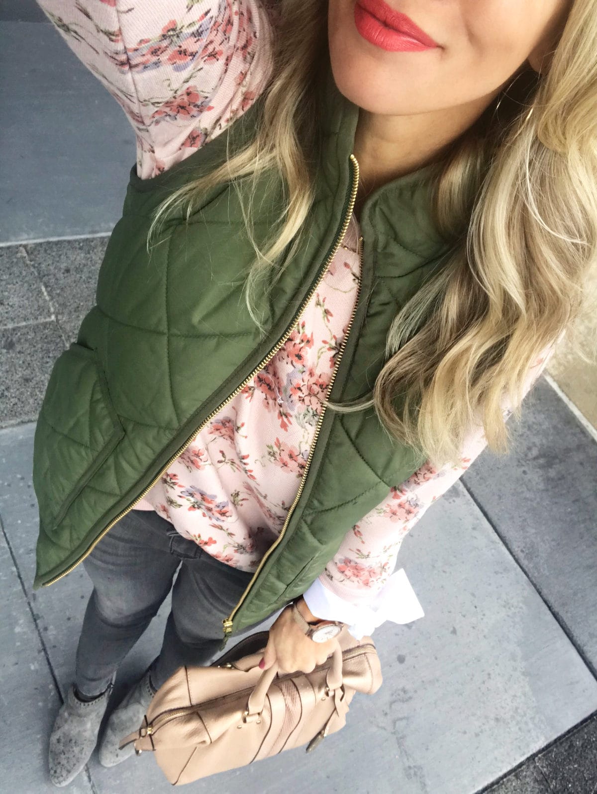 Fall Outfit Inspiration - puffer vest and sweatshirt with jeans and booties