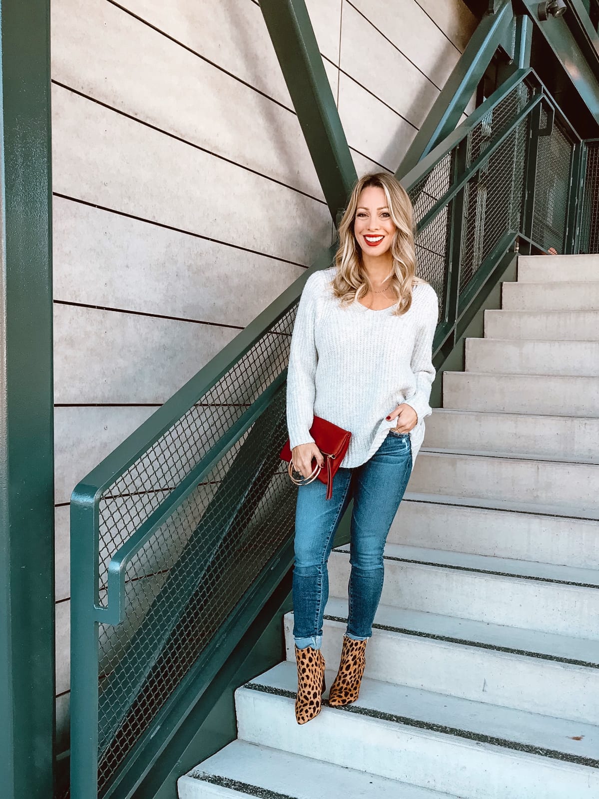 Cute winter outfit jeans sweater and leopard booties