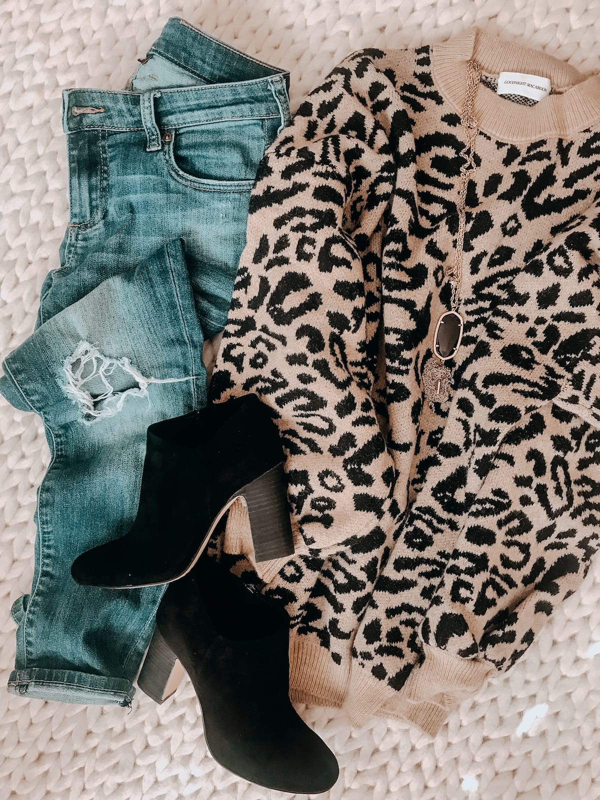 Winter outfit - leopard sweater jeans and black booties