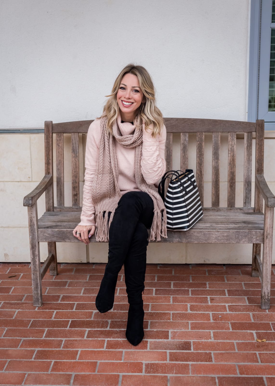 Cute winter outfit - pink sweater and black jeans