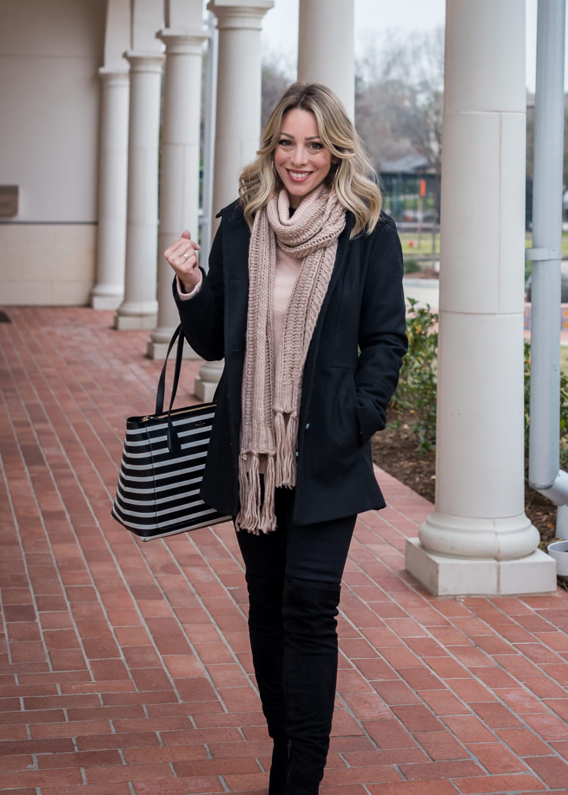 Cute winter outfit with peacoat and pink scarf