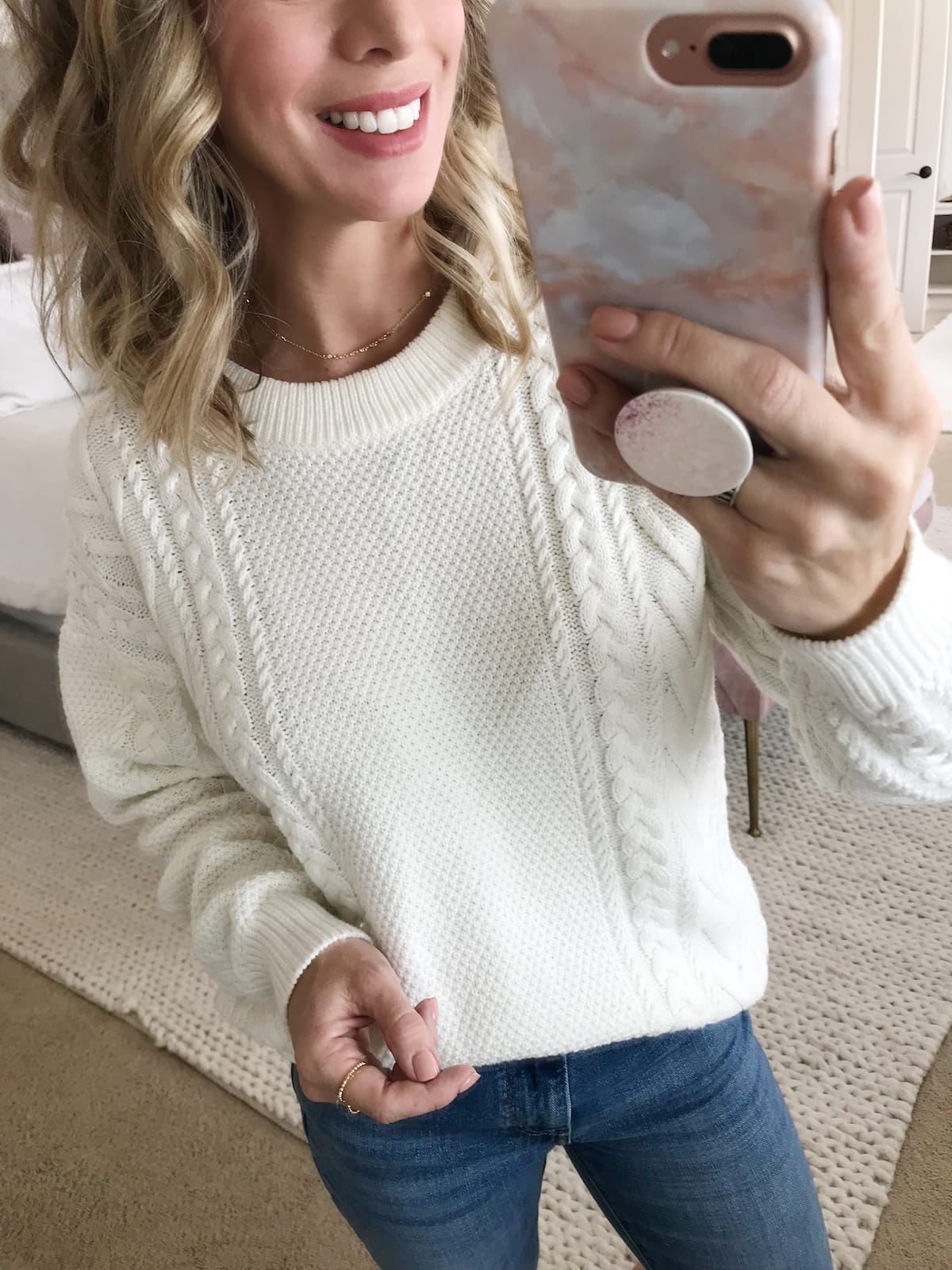 White sweater and necklace