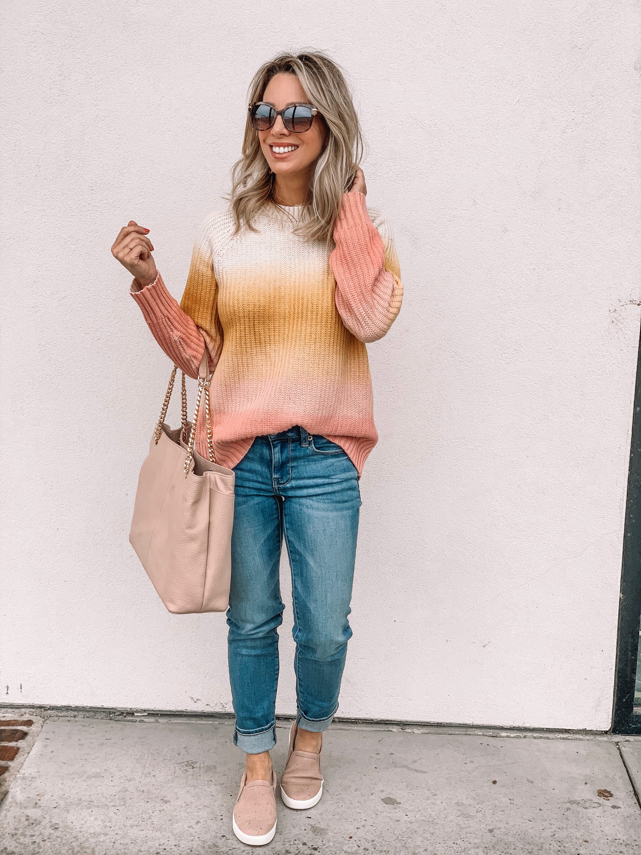 Jeans and striped sweater with pink slip on sneakers