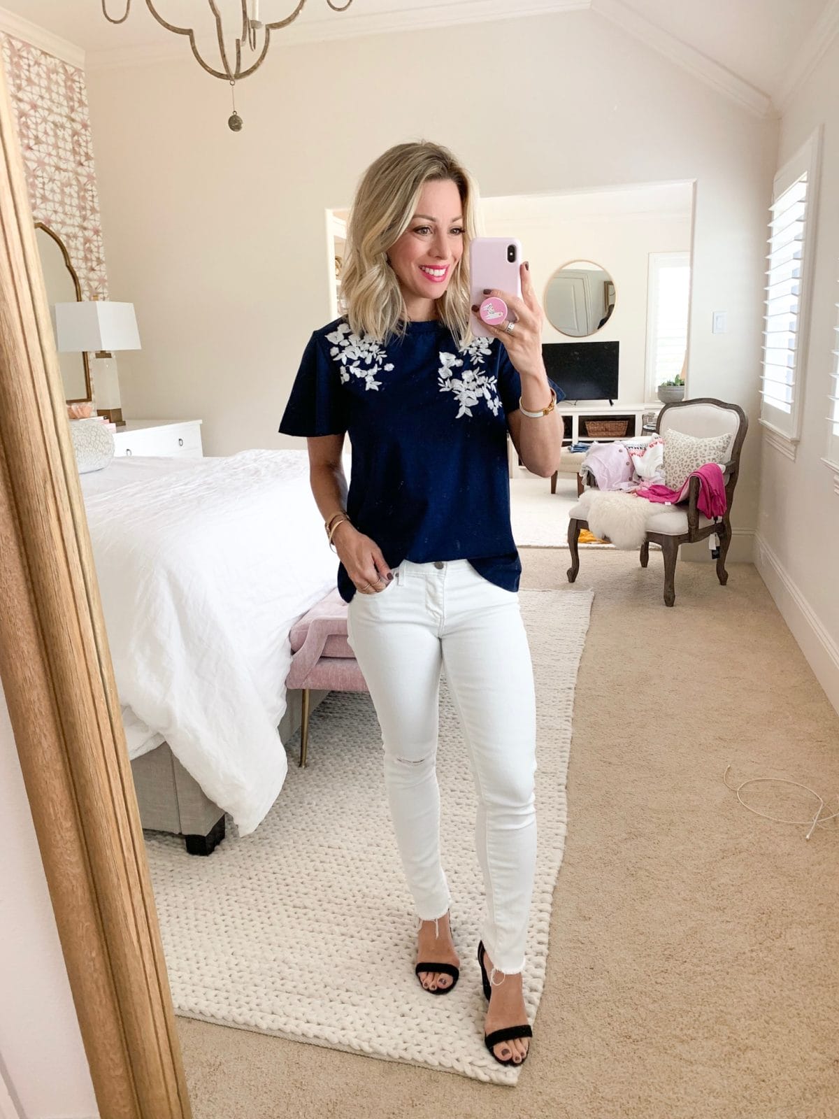 Amazon fashion faves navy embroidered top and white jeans 