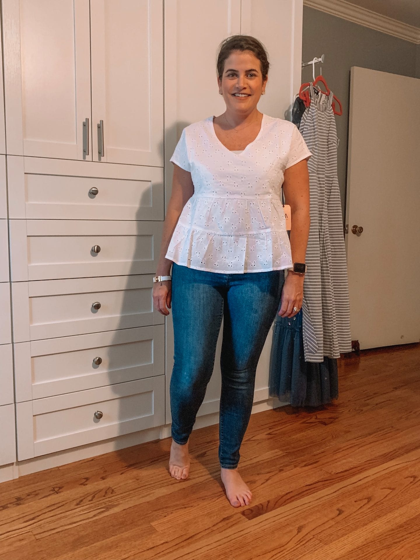 white eyelet top and skinny jeans
