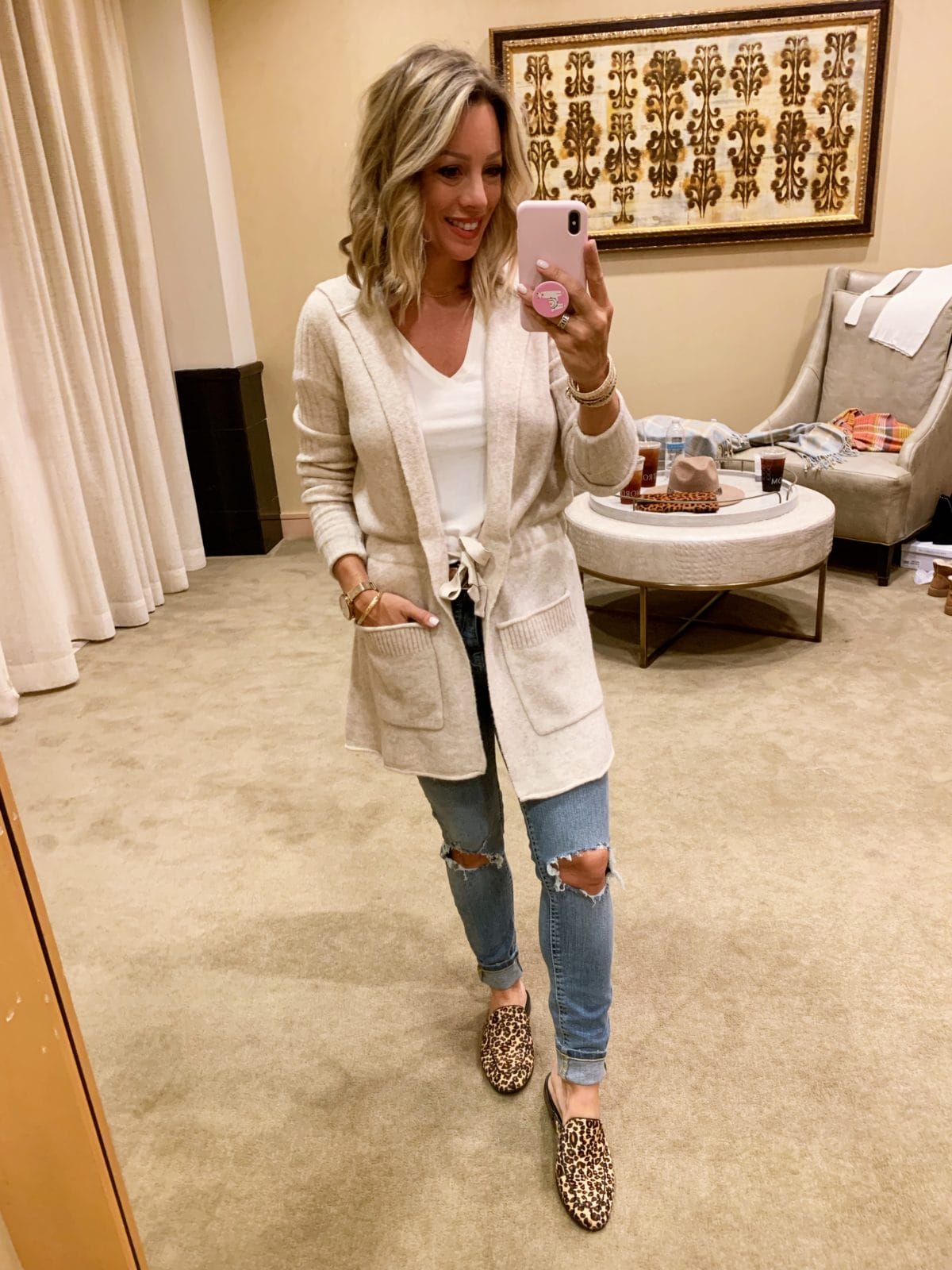 Nordstrom Anniversary Sale - white top with Jeans and boots and a cream cardigan