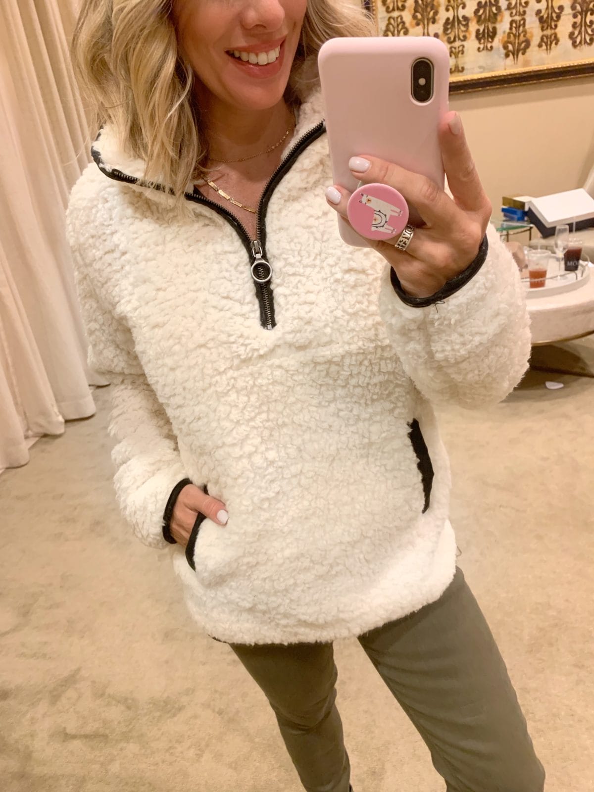 Nordstrom Anniversary Sale - white fluffy pullover with army green pants and black sneakers