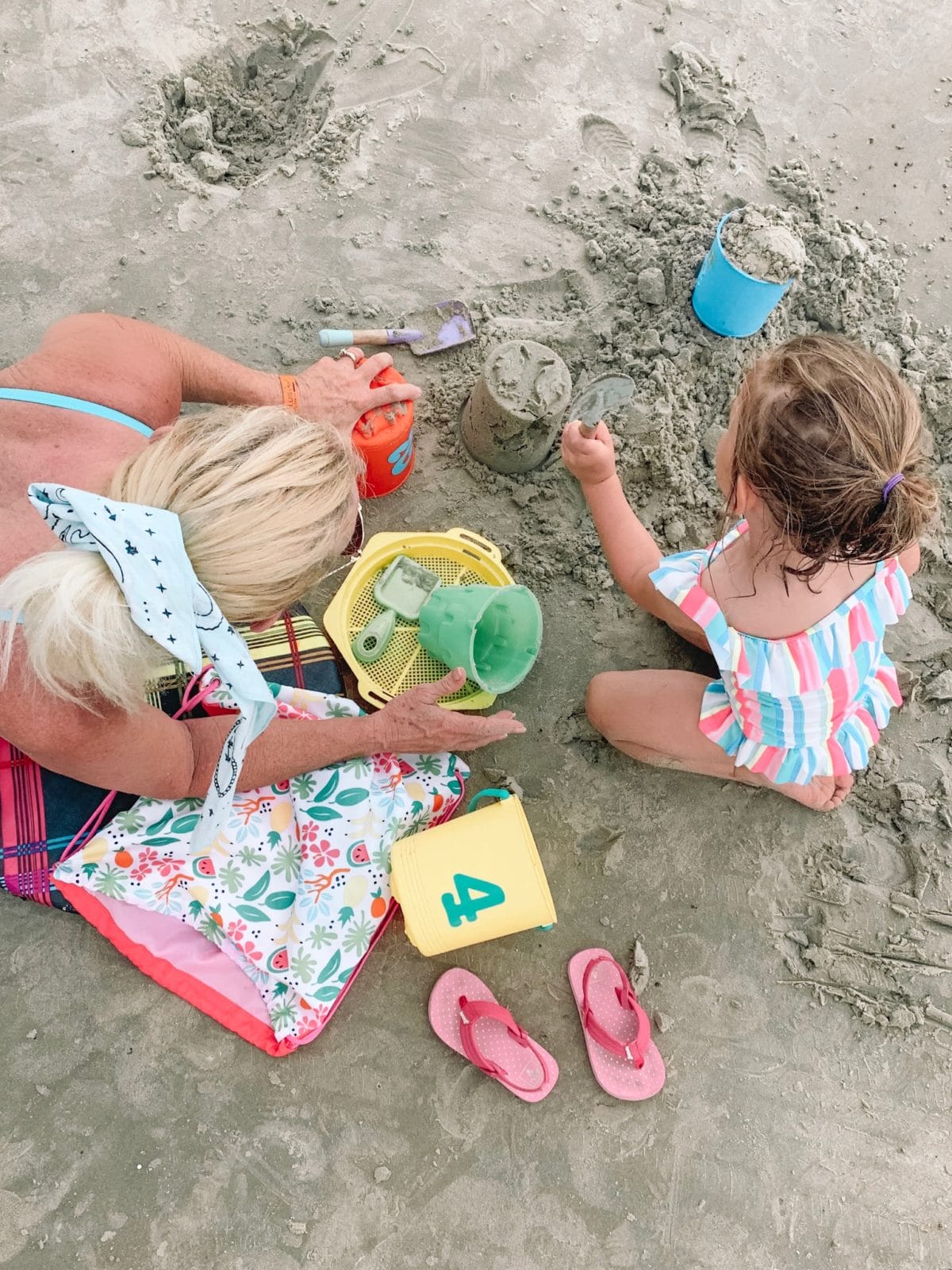 48 Hours in Galveston - Grandma and Granddaughter playing in the sand 