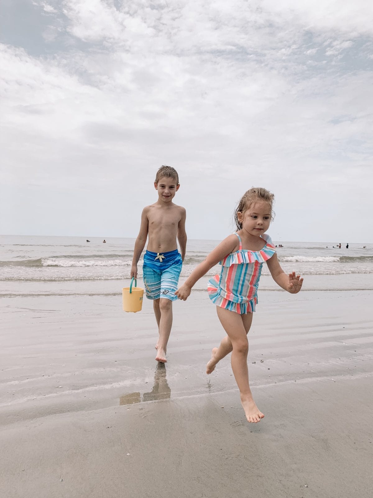 48 Hours in Galveston - siblings playing in the beach