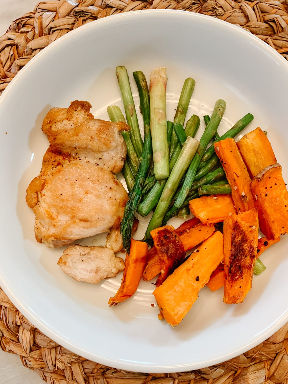 CHICKEN THIGHS WITH ASPARAGUS & SWEET POTATO FRIES