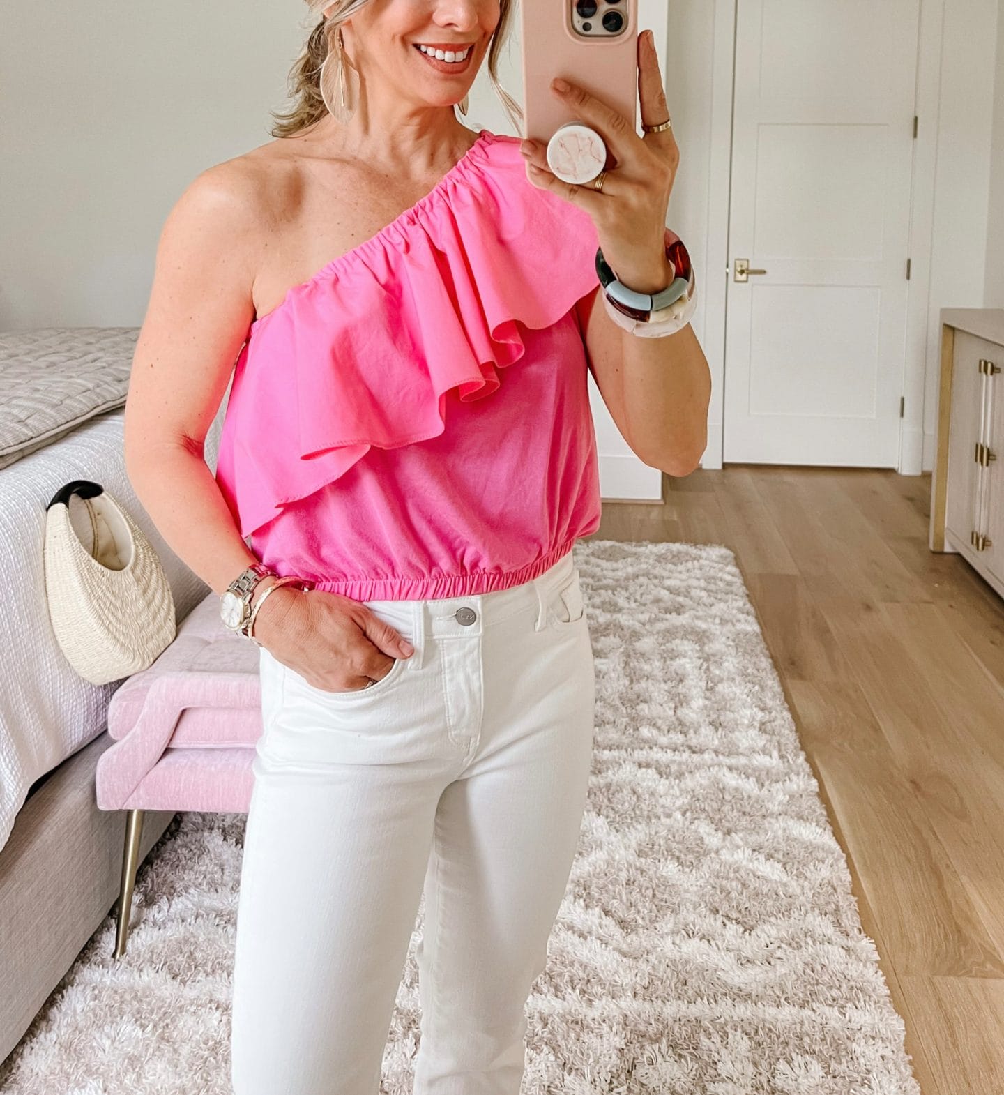 Pink One Shoulder Top, White Jeans, Wedge, Woven Bag 