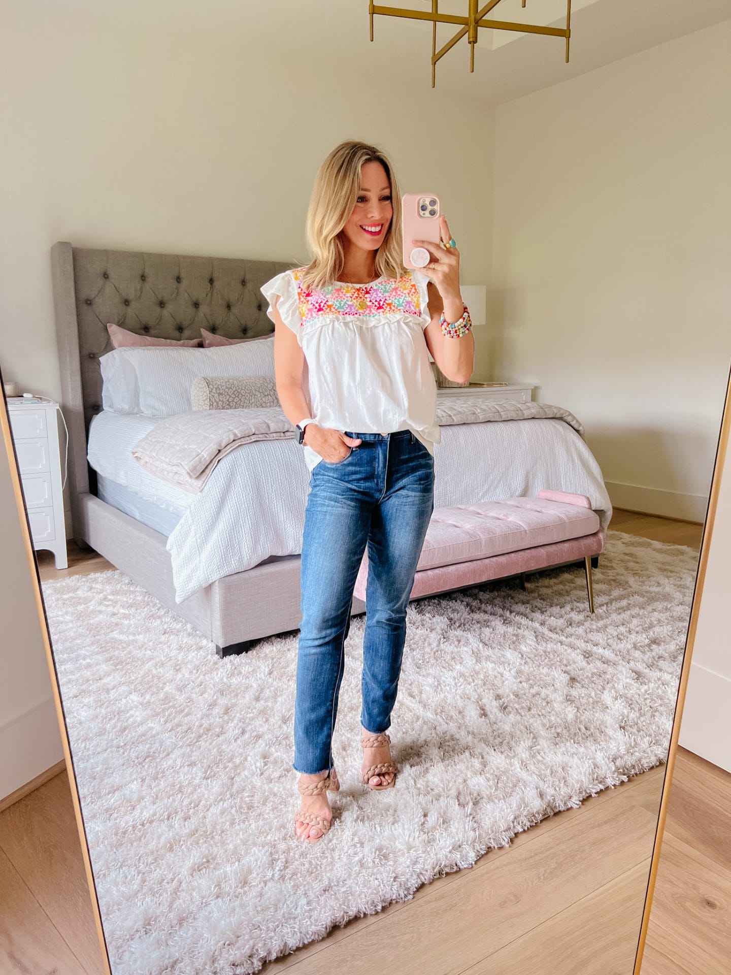 White Top with Colored Embroidery, Jeans, Sandals 