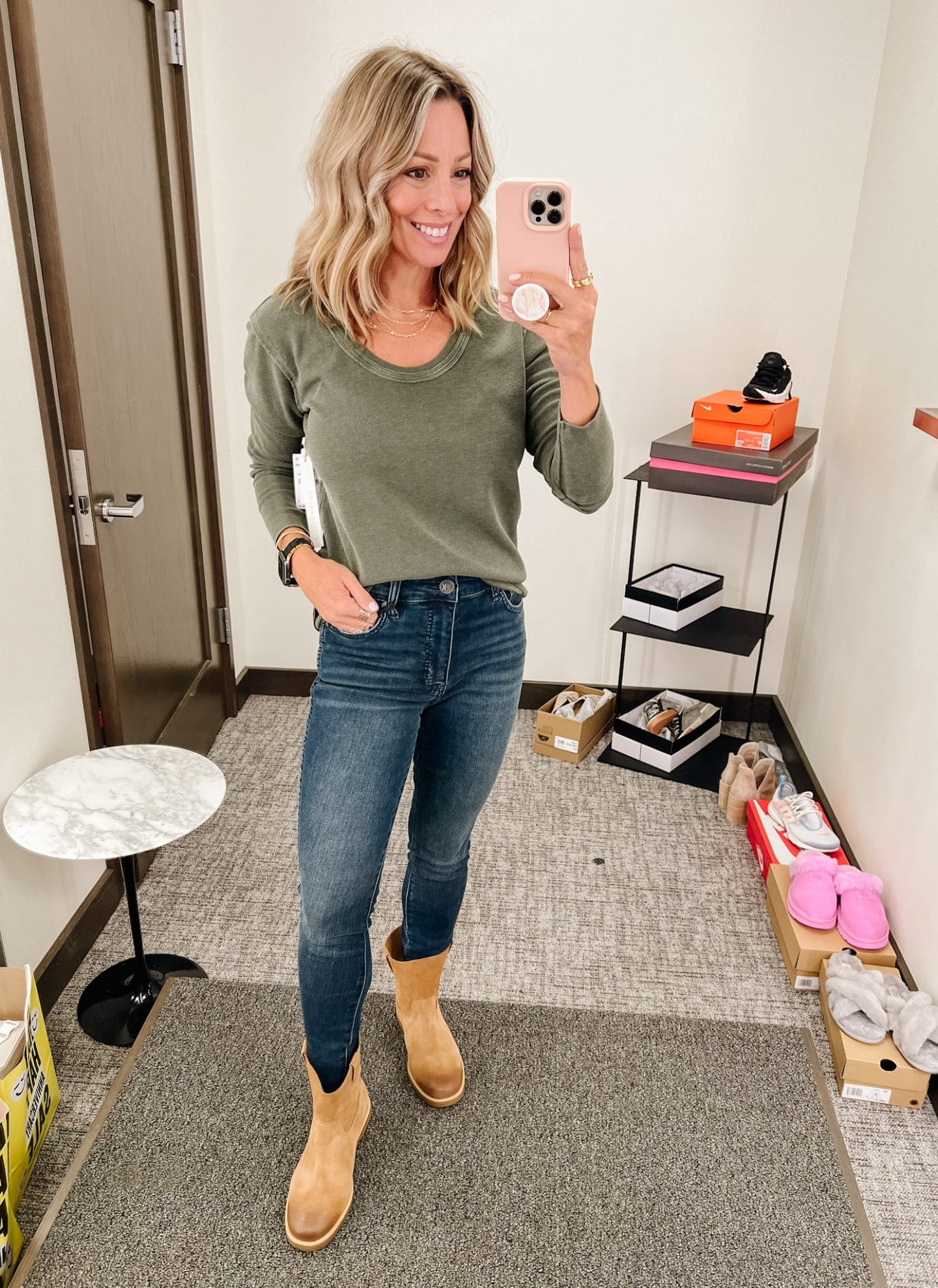Nordstrom Anniversary Sale, green henley, dark jeans, beige ugg boots, apple black and gold wrist strap, gold layered necklace