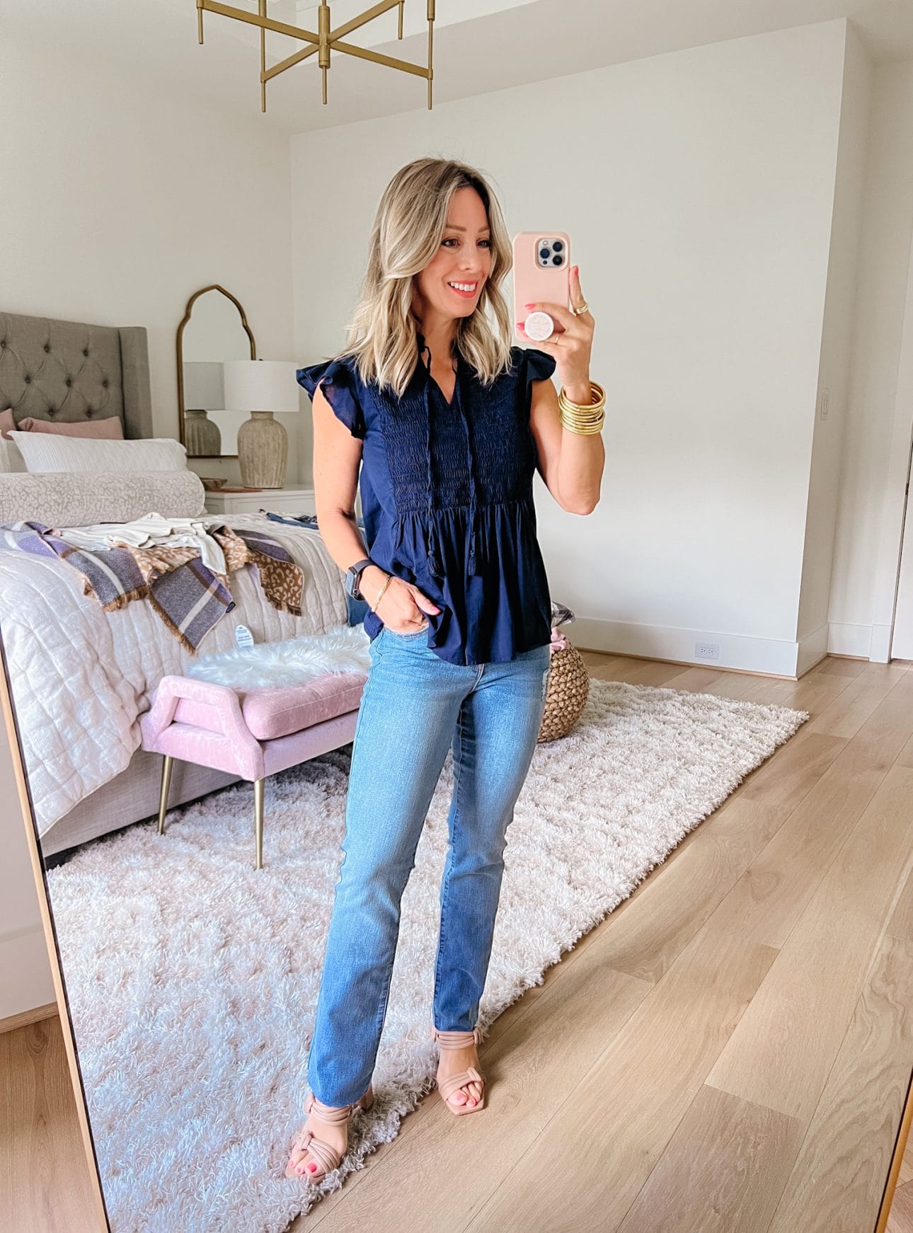 Smocked Peplum style navy top, jeans, Sandals 