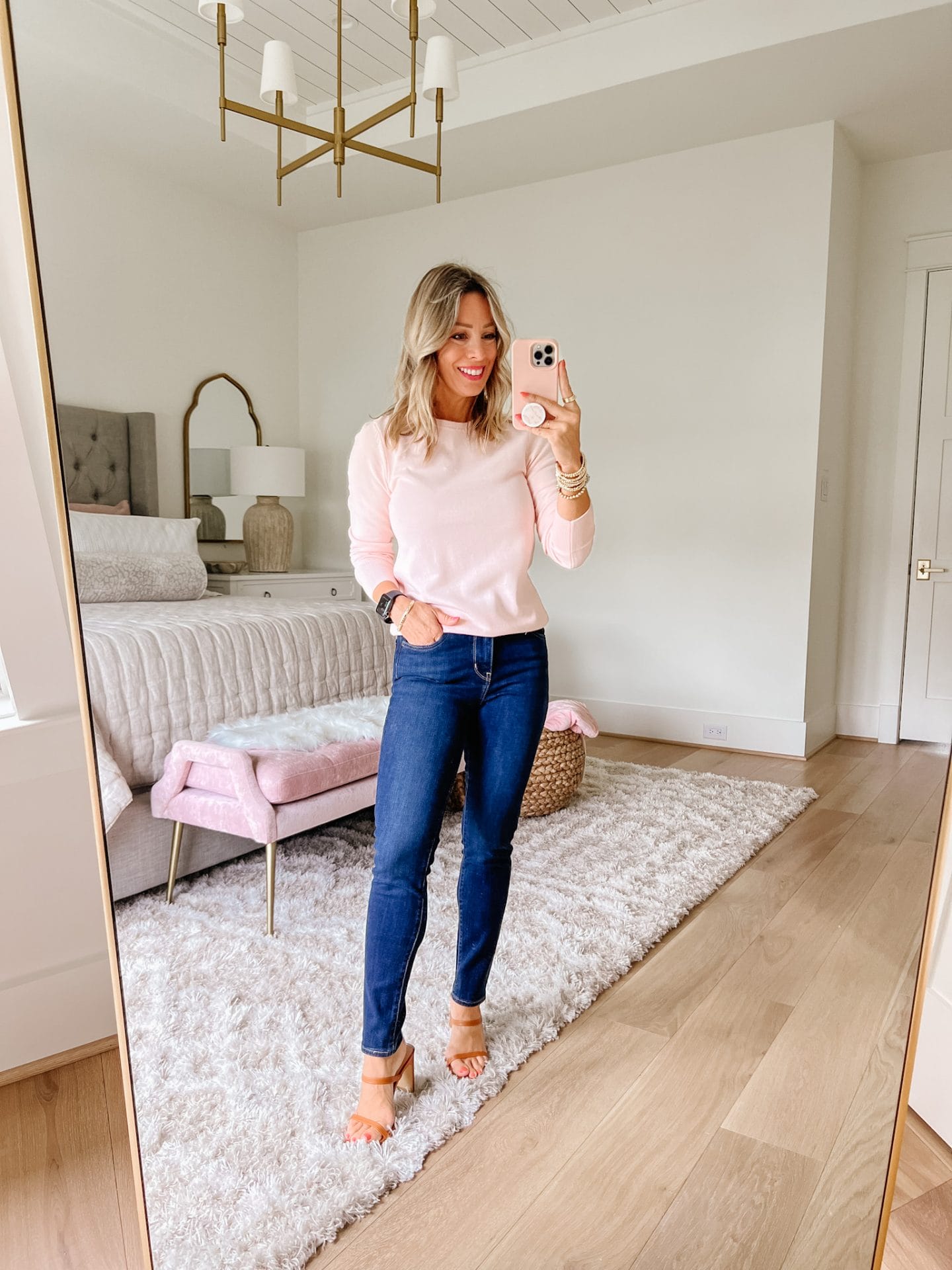 Pink Sweater, Jeans, Heels 