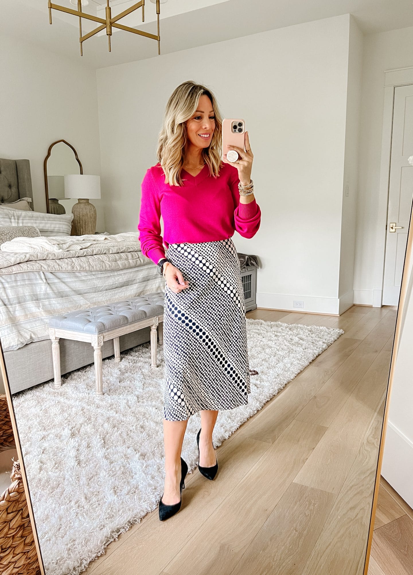 Pink Sweater, Dotted Skirt, Heels 