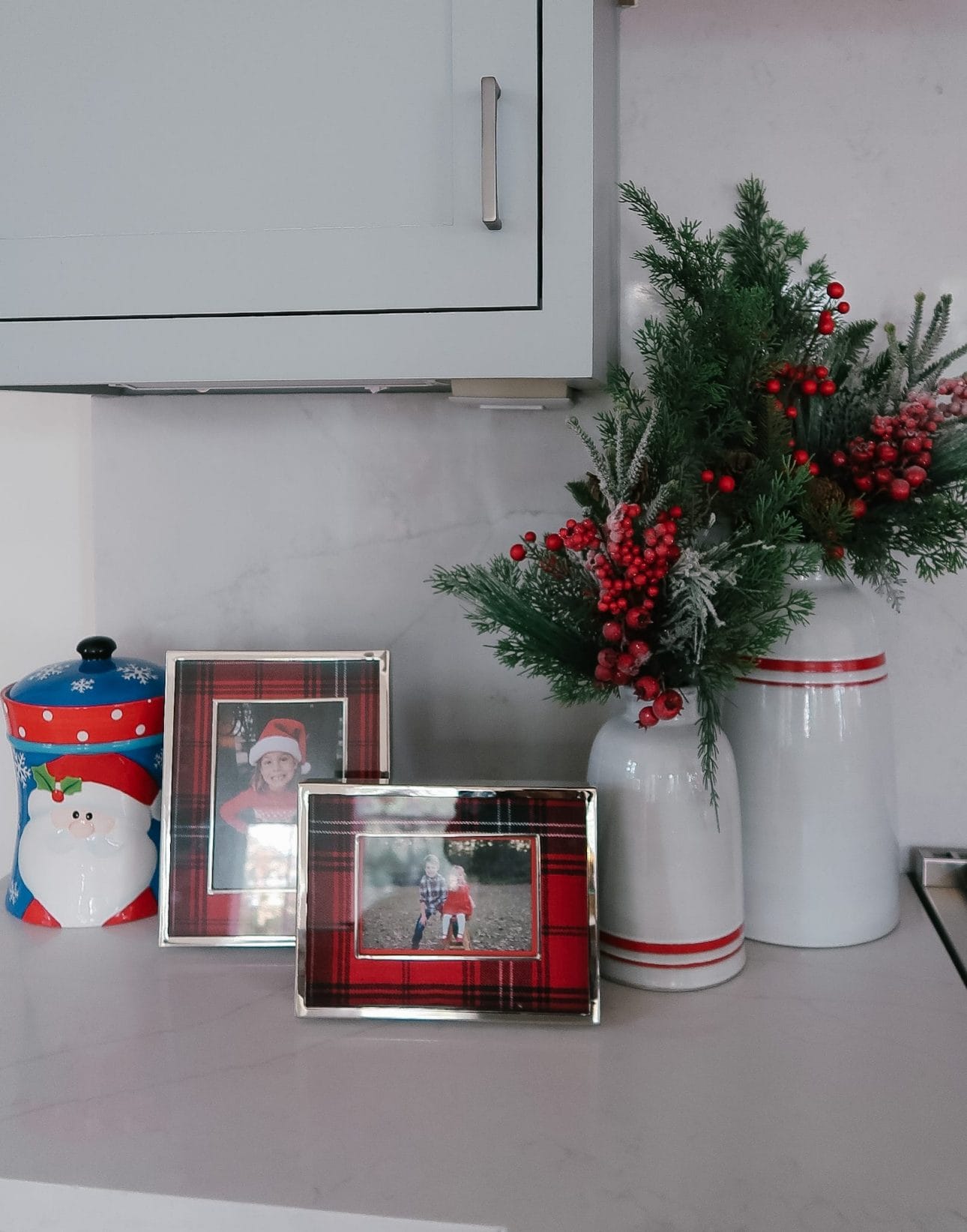 Plaid Picture frames, white with red striped vases, santa cookie jar