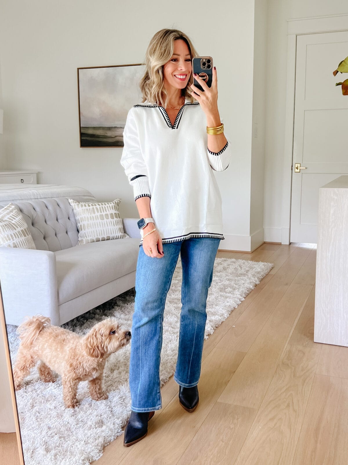 White wide collared sweater, pistola jeans, booties 